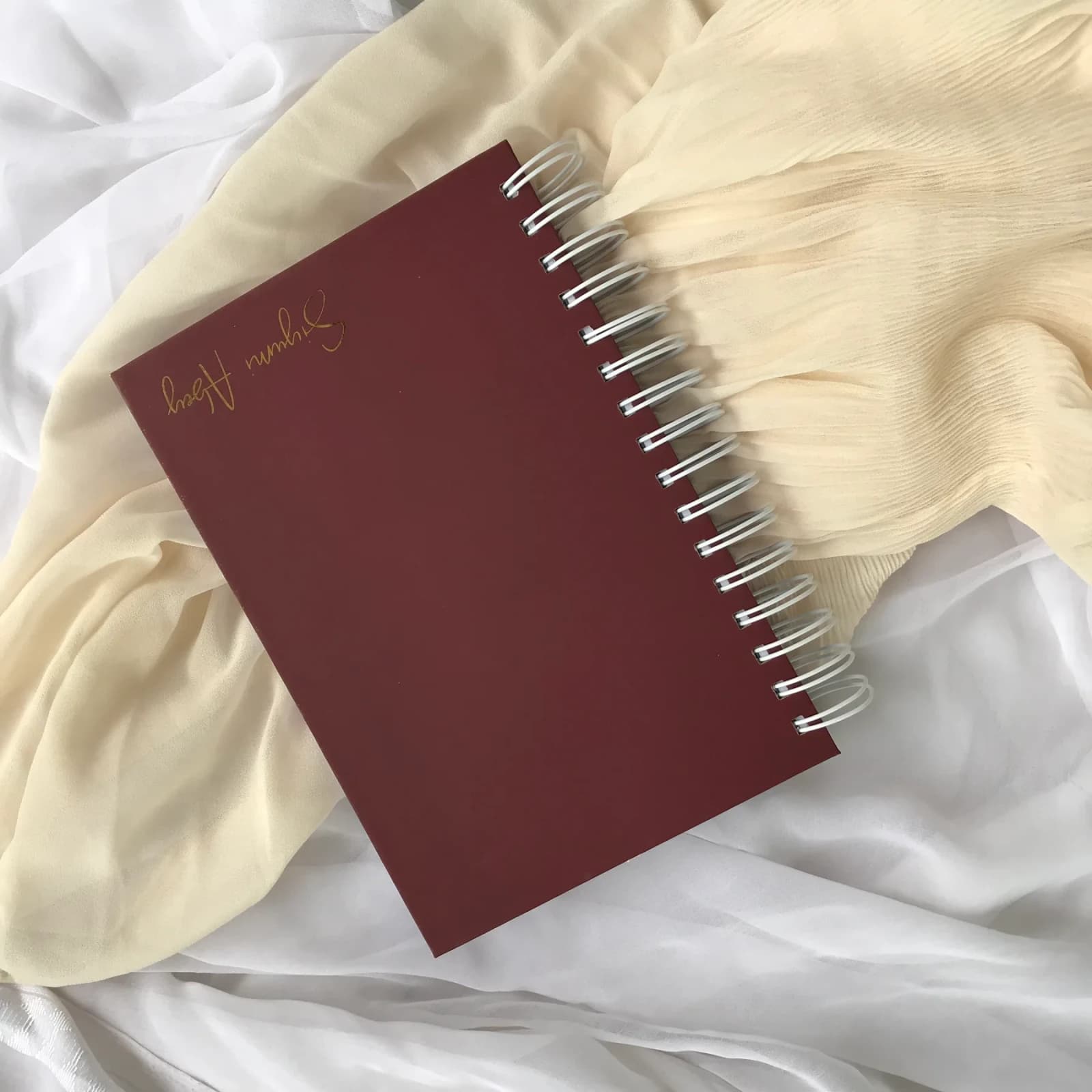 2027 Dated Diary — Two Days per Page photographed on softly styled fabric